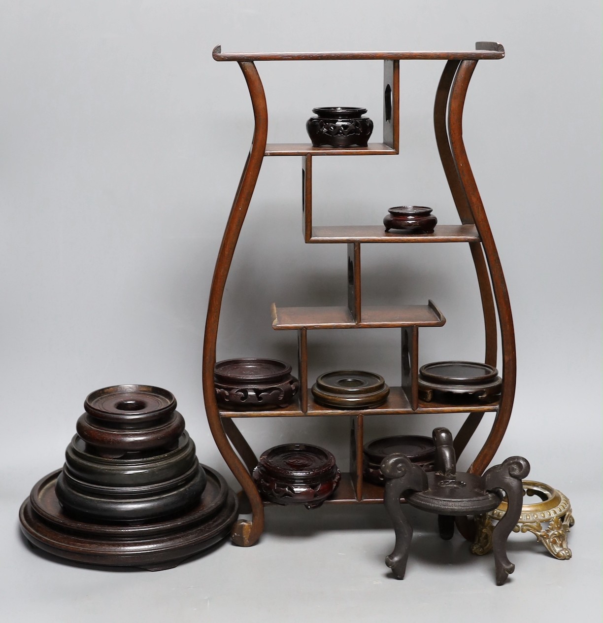 A Chinese wood shelf and various wood stands, tallest 45cm